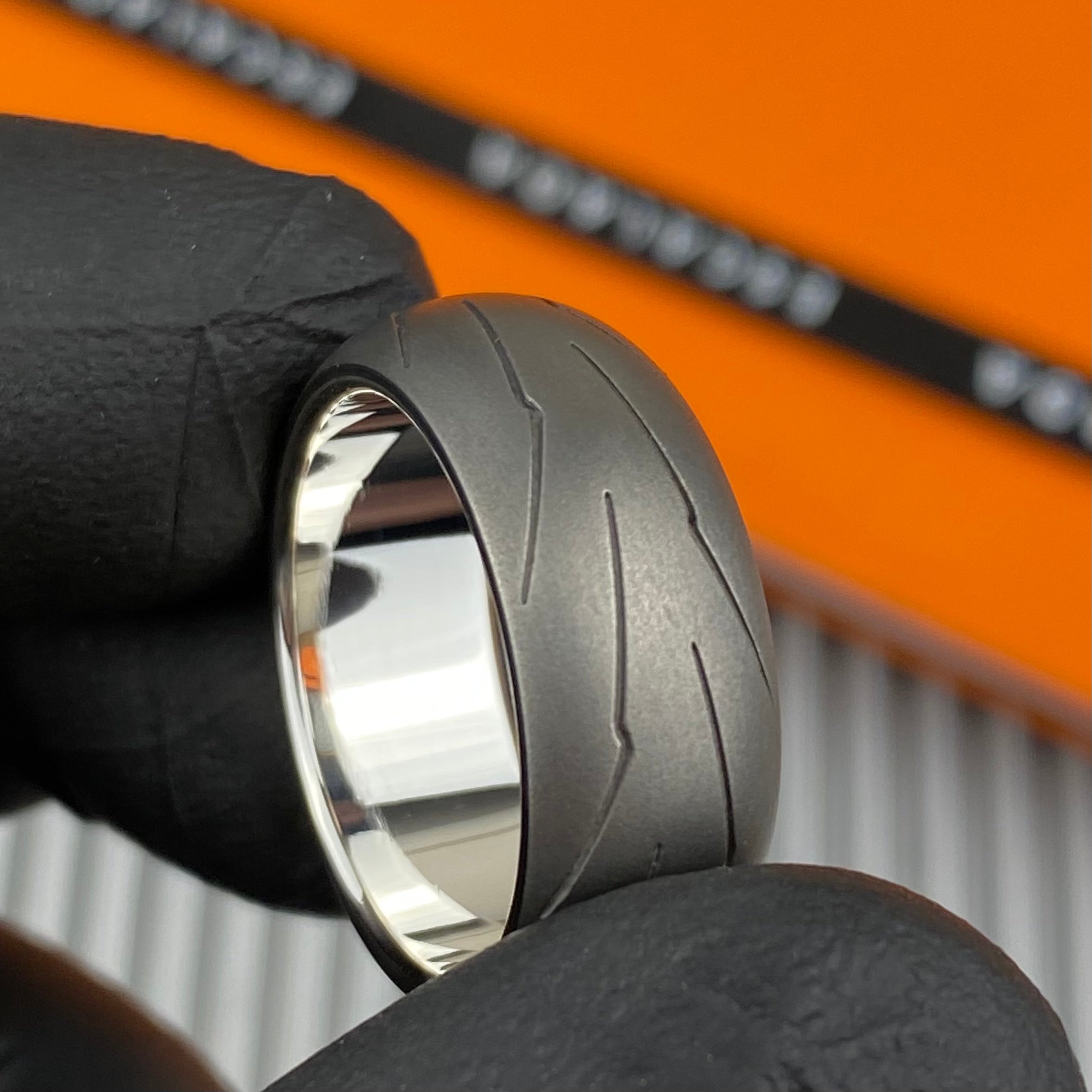 Supercorsa Titanium and silver sleeve – Racerings